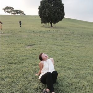 Cream mock neck sleeveless top